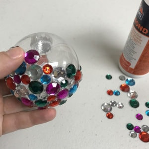 Adding rhinestones to sides of ornament