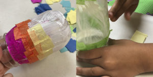 Adding pieces of tissue paper to mason jar