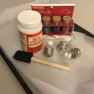 Supplies for making glitter light bulb ornaments