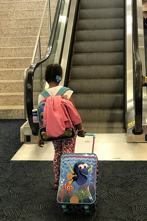 14 Survival Tips For Flying Alone With Kids