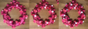 More pom poms on Valentine Pom Pom Wreath