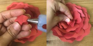 Attaching center to paper flower