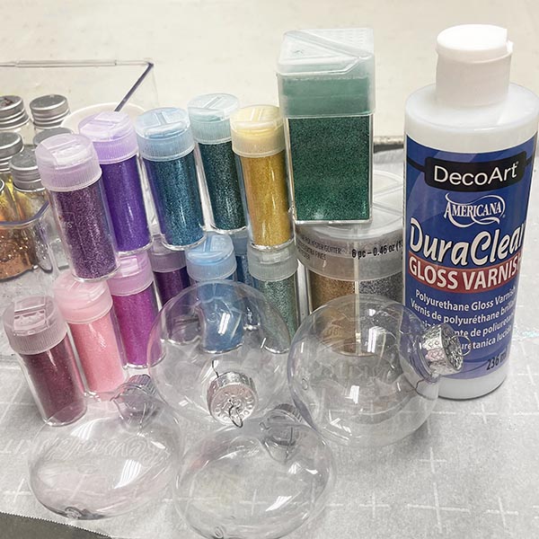 Supplies for glitter ornaments